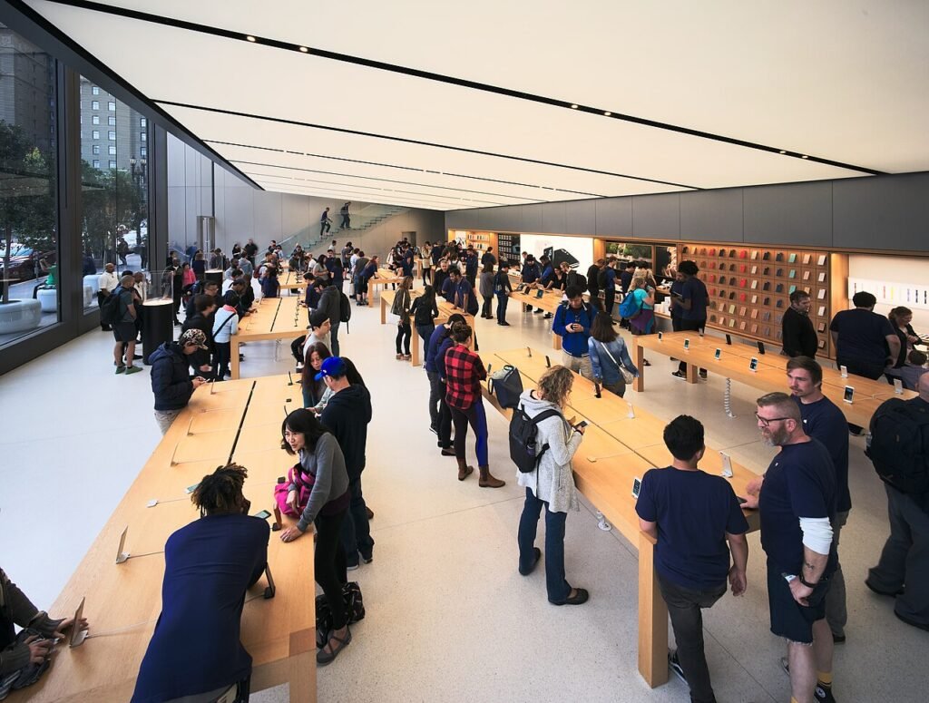 Apple Store interior with iPhone display tables