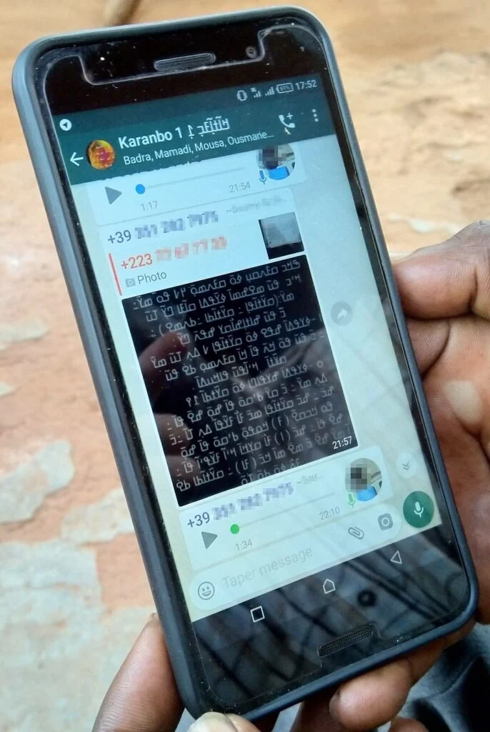WhatsApp group chat on a smartphone WhatsApp group chat on a smartphone